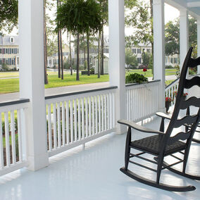 Koma porch flooring on a classic Southern porch with rocking chairs